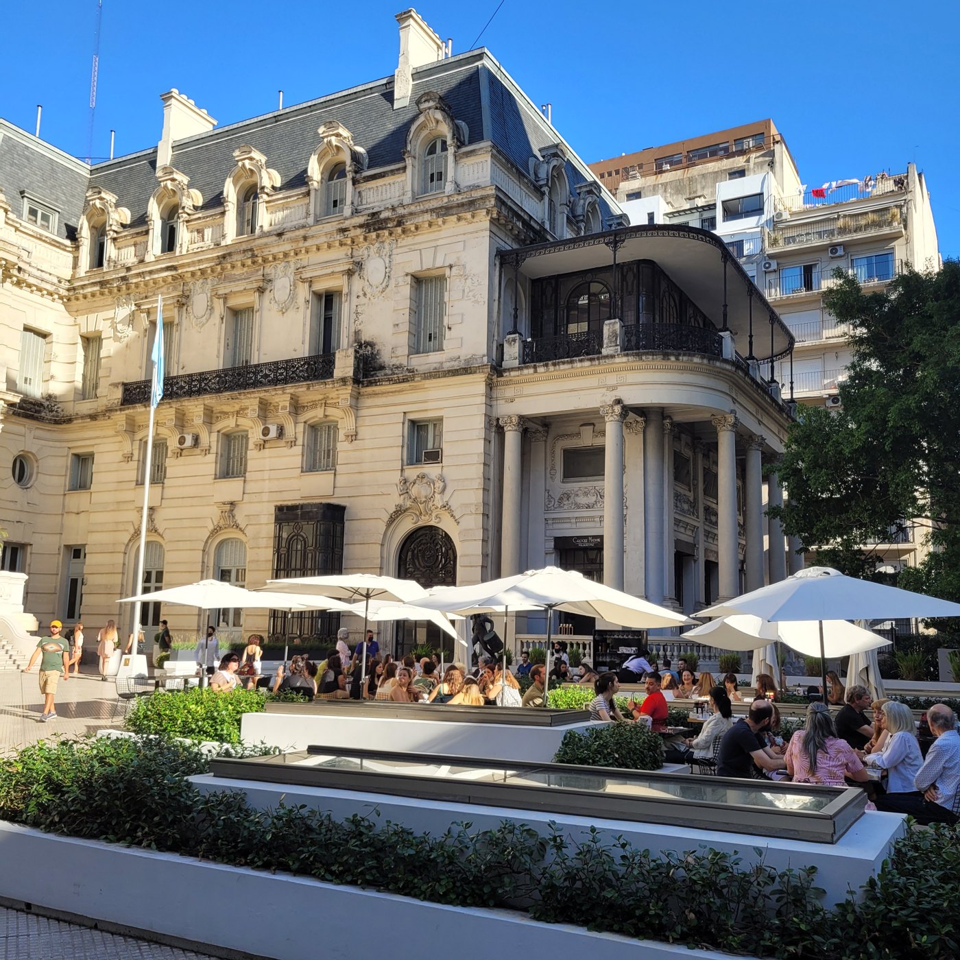 Historic building and outdoor café tables in Recoleta