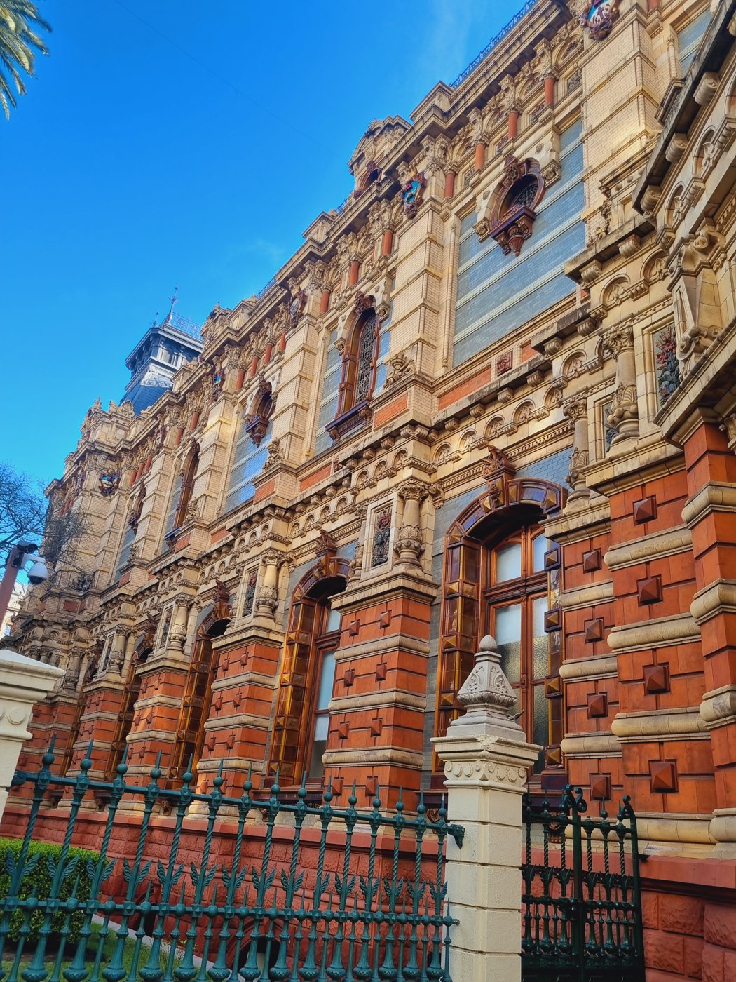Ornate red-brick façade of the Water Palace in Buenos Aires