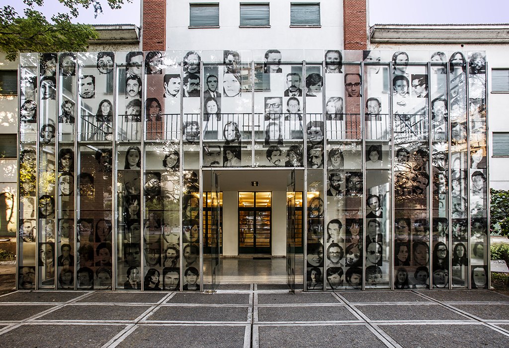 Portraits on the façade of the ESMA Museum and Site of Memory