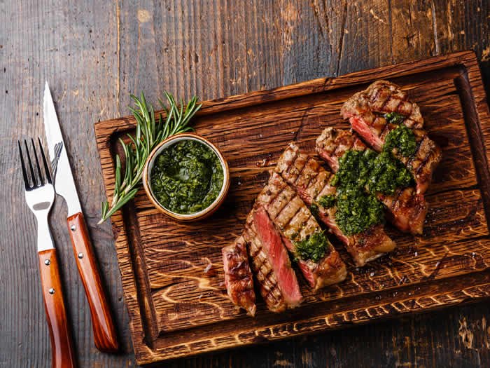 Argentine grilled meat served on a wooden board